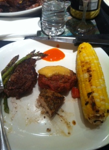 (from left) asparagus, turkey burger with gouda, swordfish, corn, and buffalo sauce for dipping